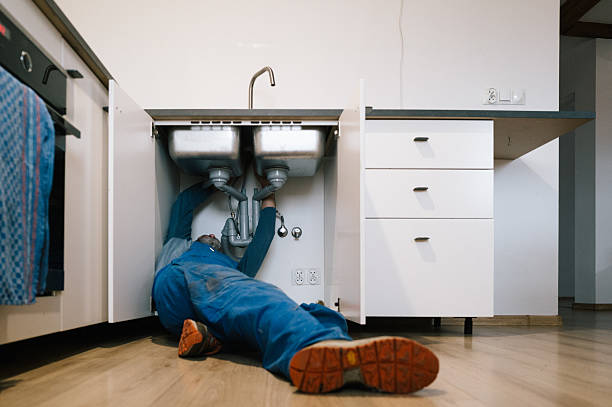 Professional Drain Cleaning technician working in Manville, RI